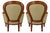 Elegant pair of Louis XVI-style walnut armchairs featuring curved backs, tapered fluted legs, and tailored green patterned...