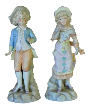 German Bisque Porcelain Figurines of a Boy and a Girl Statue - a Pair