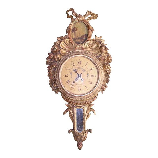18th Century French Louis XVI Carved Giltwood Wall Clock With Oval Painting For Sale