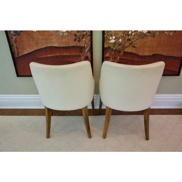 Elegant Pair of Bright Chair Maria Arm Chairs upholstered in Jane Churchill Darwin Cream with natural oiled walnut finish...