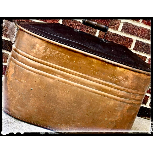 Outstanding late 19th-century Early American primitive copper boiler wash tub with its original dark-patinated matching...