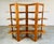 An elegant minimalist freestanding teak shelving unit that is versatile in design giving the option to place in the middle...