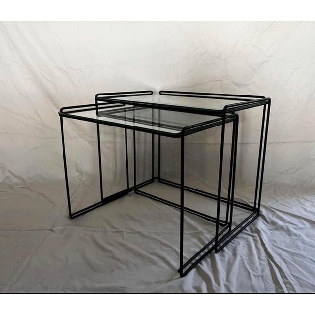 Set of two ‘Isocele’ nesting tables designed by French artist Max Sauze and produced by Groupe S.A France, circa 1970. The...