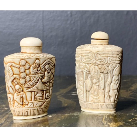 Pair of early 20th century carved small bottles sniffers with rich hand carvings No marks, 1.5-2.5 tall Rich carvings with...