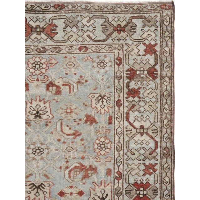 This mid-20th-century Persian Malayer accent rug presents a finely balanced floral and geometric composition across a soft...