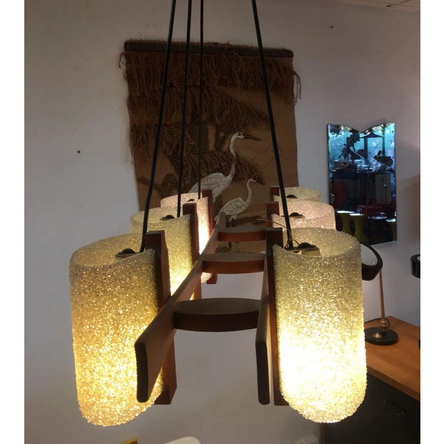 Beautiful chandelier from the 50's, teak structure, resin lampshade for a warm diffusion of light. European Plug (up to...