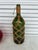 Vintage mid 20th century Macrame Wrapped Glass Decanter. Green glass Bottle with rope.