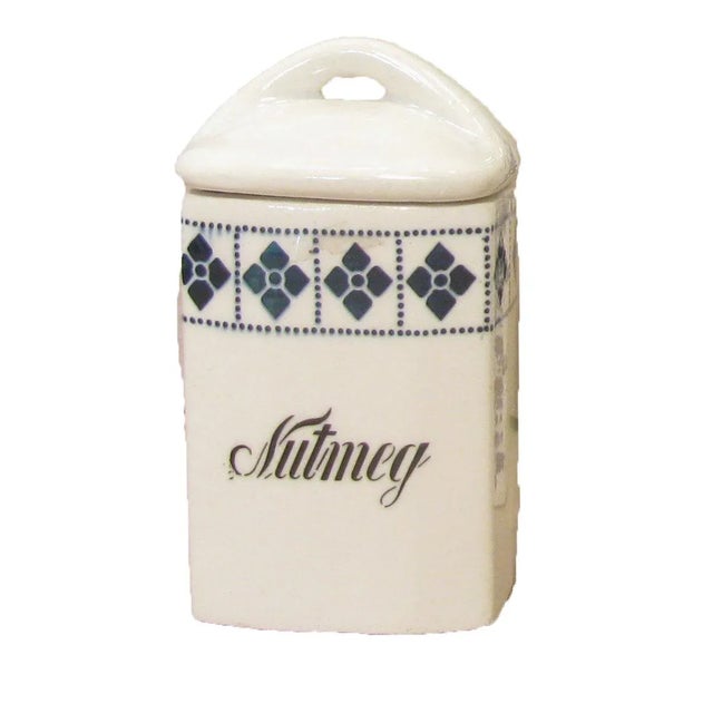 Set of three canisters in complementary blue and white designs. Vinegar cruet, 3"W x 2.25"D x 9.5"H; oatmeal jar, 4"W x...