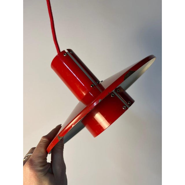 The flipper pendant lamp is a striking design by mogens davidsen for sc sørensen and a true highlight for lovers of bold...