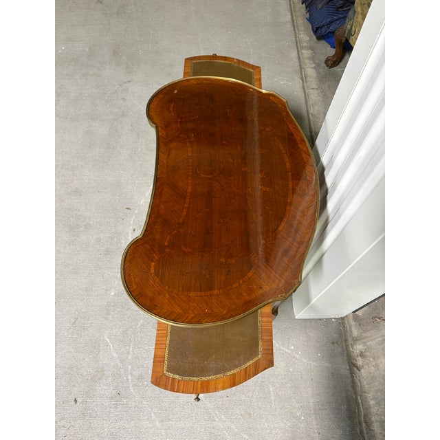 French Style Kidney Shaped Writing Table or Bureau Plat, 20th Century. Curved kidney shaped form. Three center drawers...