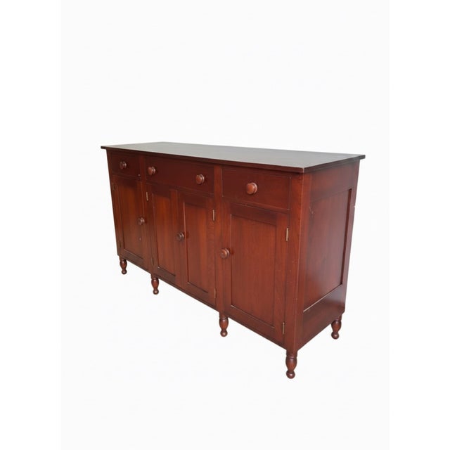 Handsome solid cherry buffet/sideboard by Tom Seely Furniture, crafted in the company’s tradition of finely made American...