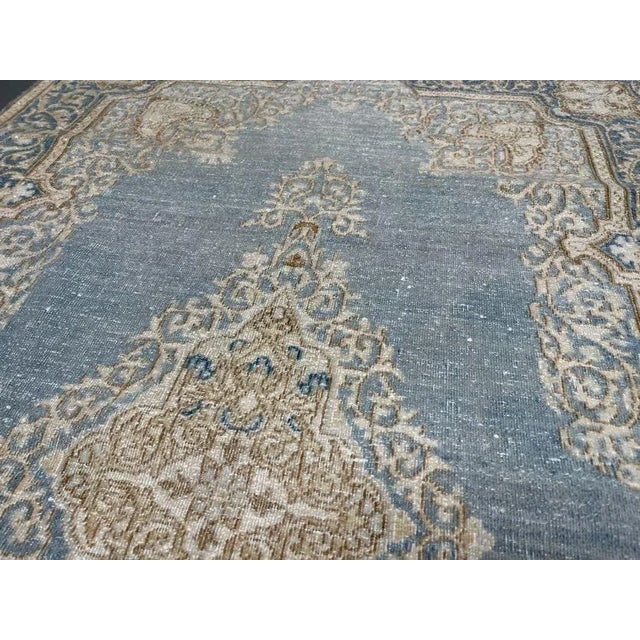 This Stunning Kerman Shah Rug was hand knotted in 1950’s with 75% wool and 25% cotton dyed with vegetable color. This rug...