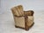 1950s, Danish relax armchair. Brown furniture velour, carved oak wood, brass springs in the seat. Wear consistent with age...