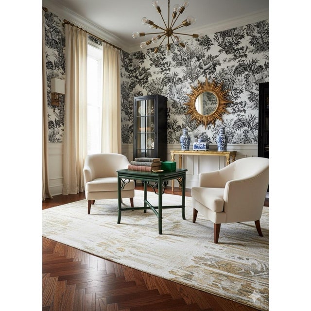 Indulge in timeless elegance with this exquisite vintage rattan side table, expertly curated by Turtle and Crane. This...