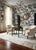 Indulge in timeless elegance with this exquisite vintage rattan side table, expertly curated by Turtle and Crane. This...