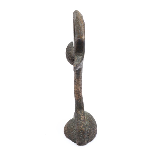 Bronze Modernist Figural Sculpture - 20th century, patinated bronze with asperous surface texture, perhaps representing a...