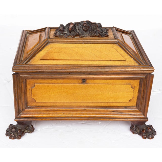 Italian. Renaissance style jewelry box with secret compartment. Carved walnut with satinwood panels. Velvet interior. Mid...