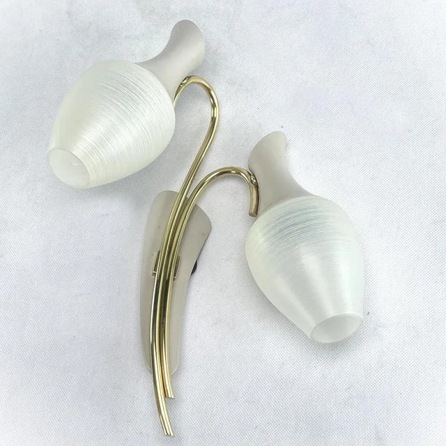 Vintage midcentury wall lamp, 1950s. This great lamp is a real classic from the 1950s. This lamp has an extraordinary...