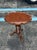 A refined Queen Anne style tea table by Baker Furniture from their esteemed Historic Charleston Collection. Crafted in...