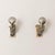 A pair of 1970s Italian wall lamps crafted from metal and brass, featuring a dramatic Gothic-style hand-shaped form. The...