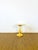 Stunning side table/console crafted from genuine onyx, a fine natural stone with warm, golden-yellow hues. Its sculptural...