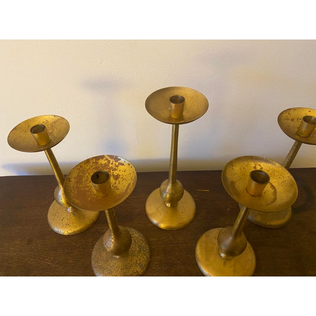 Set of 5 Brass candlesticks 4 short, 1 tall (11.25" tall) felt on bottom to prevent scratching