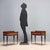 Two vintage bedside tables of 20th century Italian manufacture with exotic wood veneer, back-treated glass. This piece is...