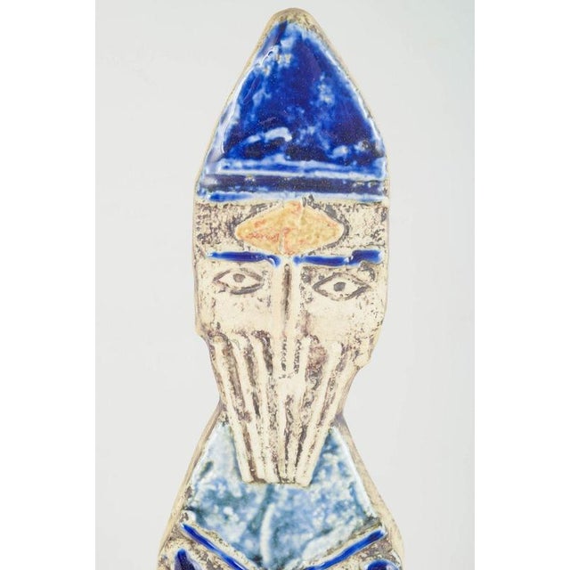 Lisa larsson for gustavsberg large wall relief “bishop”, 1970s. Monumental hand-glazed wall figure in chamotte stoneware...