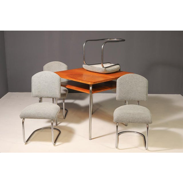 Czech Functionalist Dining Room Set by Robert Slezák, 1940s, in Very Good conditions. Designed 1920 to 1949 This piece has...