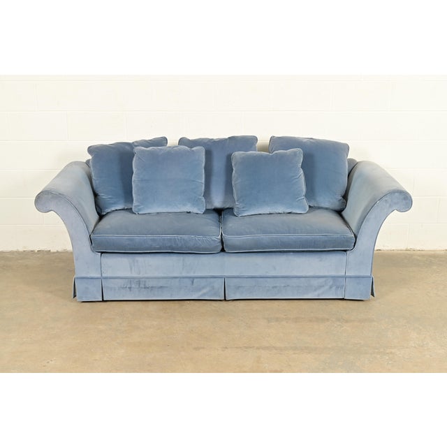 A gorgeous traditional velvet upholstered roll arm sofa or loveseat By Baker Furniture USA, Circa 1980s Measures: 86"W x...