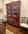Crate & Barrel Rojo Red Tall Cabinet Stately storage with a red waxed patina, hand-forged iron hardware and wood hasp door...