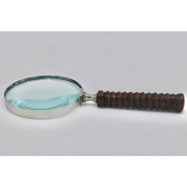 A superb vintage carved wooden handle magnifying glass, circa 1950s. This is an excellent magnifying glass with a sterling...