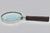 A superb vintage carved wooden handle magnifying glass, circa 1950s. This is an excellent magnifying glass with a sterling...