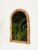 Wonderful mid-century arch-shaped mirror in curved bamboo and hand-woven rattan wicker. This stylish French Riviera style...