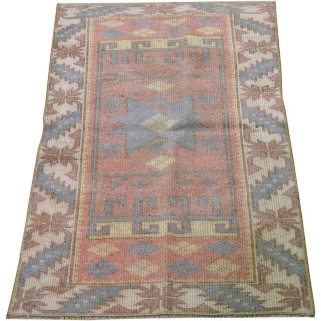 Hand-knotted with care using traditional rug-making techniques, this wool rug blends timeless craftsmanship with a modern...