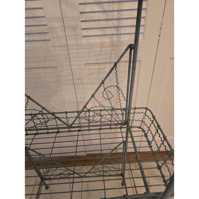 A very rare 1940s French handmade etagere with it's original baby blue paint decorated patina. Having high quality...
