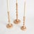 Traditional style in a contemporary fabrication, this set of soft pink taper holders is designerinspired. Made of enamel...