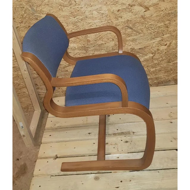 Vintage cantilever armchair designed by rud thygesen and johnny sorensen for magnus olesen, labeled made in Denmark....