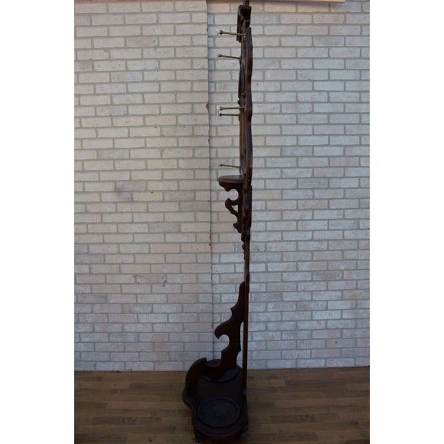 Antique Victorian Hall Tree with Mirror and 2 Umbrella Stands This beautiful Victorian hall tree has wonderful cutout...