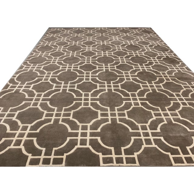 A contemporary style hand knotted using a combination of wool and viscose that adds a soft silky sheen to the overall look.