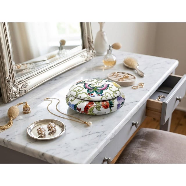 Offering a beautiful antique Chinese Famille Rose porcelain butterfly lidded box. The box is most likely from the Mid 20th...