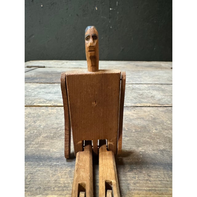 Early 20th Century Folk Art Bounce Man Great patina looks. Dimensions:14.5”d x2”w x 9”h. Condition:finish worn and nice...