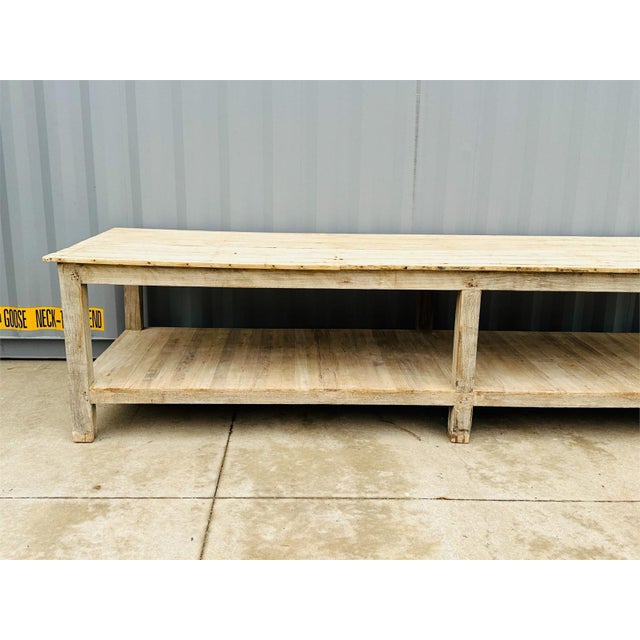 A massive antique circa 1800s French bleached wood Draper’s table. In excellent condition for its age, plenty of signs of...