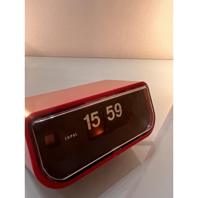 Vintage Japanese Red Copal Clock, 1970s, in Very Good conditions. Designed 1970 to 1979 This piece has an attribution...