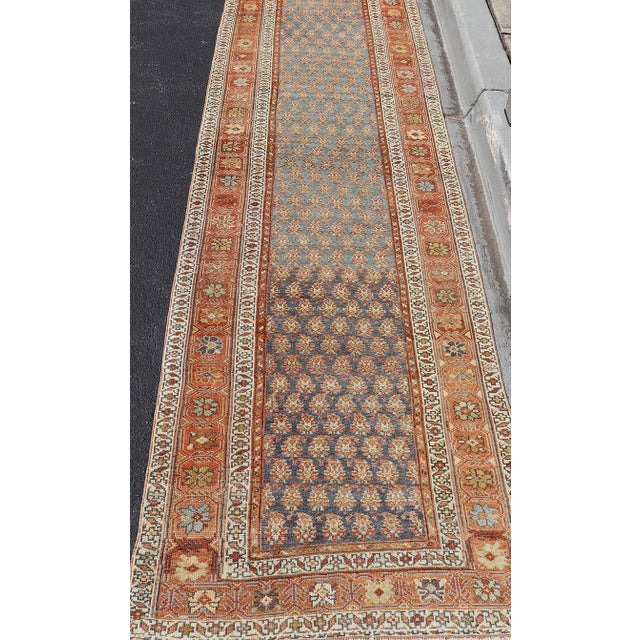 Measures: 3'2 x 15'8 Antique Northwest Persian Runner with All-Over Floral Design and Vibrant Border 3'2 X 15'8 Keivan...