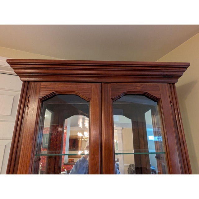 A traditionally styled curio cabinet made by Pulaski that will fit nicely in both small or large spaces. Two full-length,...