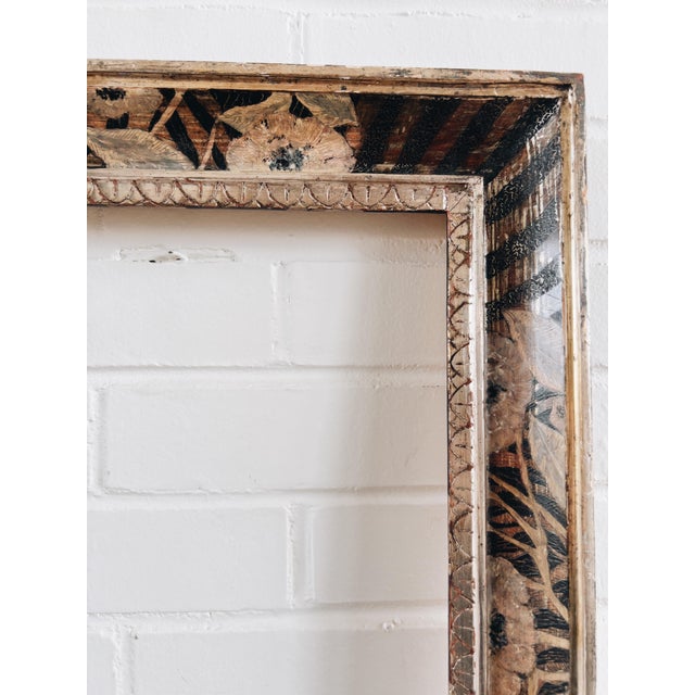Stunning hand-painted frame, marked "Made in Italy". Flowers and stripes in black, rose gold, and silver leaf.