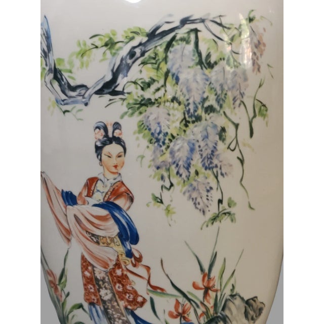 This beautiful vintage vase is a true work of art. Inspired by Japanese culture, it features a hand-painted figural geisha...