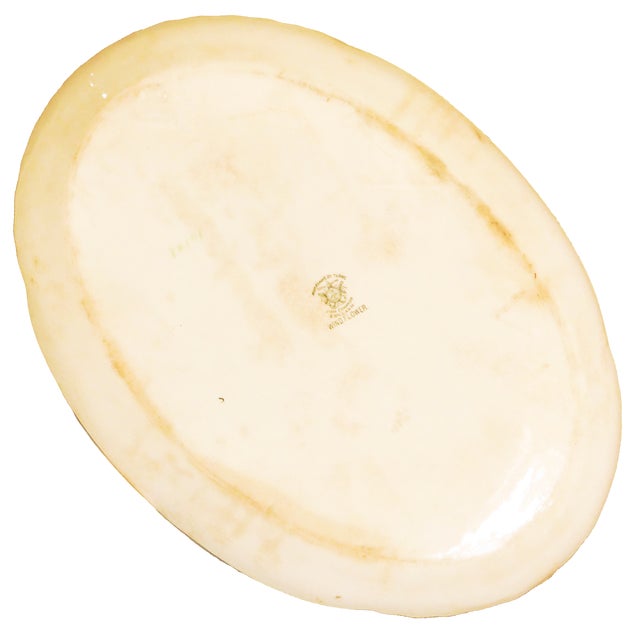 Softly romantic and beautifully understated, this generously proportioned (16.4" x 11.75") antique English ironstone oval...