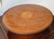 An Inlaid Mahogany Lazy Susan, made in England in the first half of the 20th Century around the 1930s. A Lazy Susan is a...
